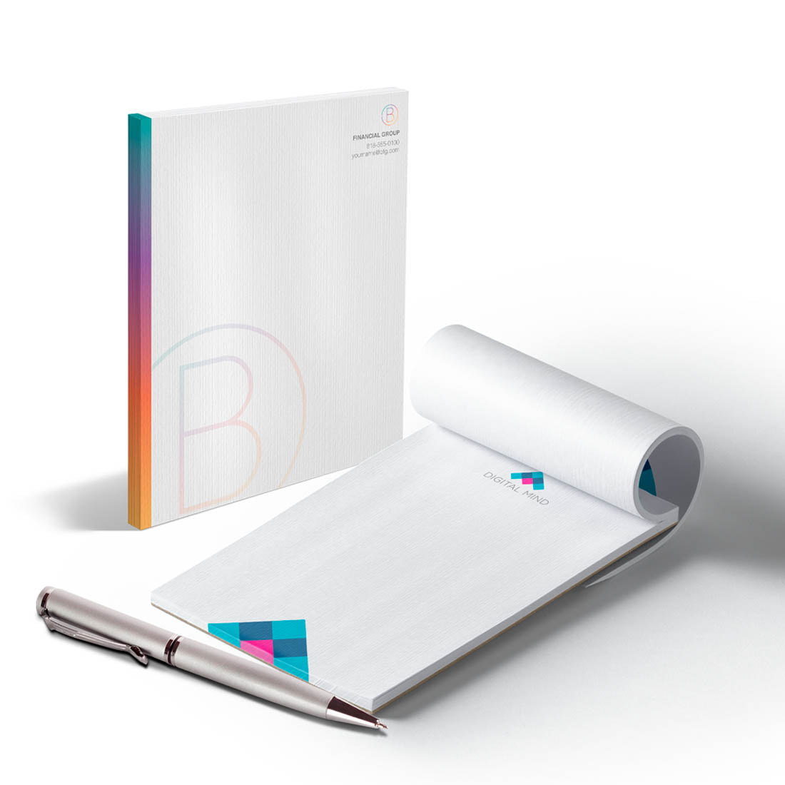 Custom branded notepad set featuring minimalist financial group design and colorful digital logo