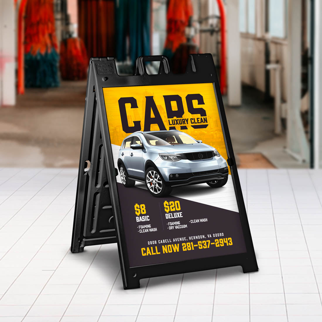 A-frame sign advertising car wash services with bold yellow and black design