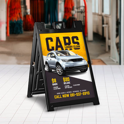 A-frame sign advertising car wash services with bold yellow and black design
