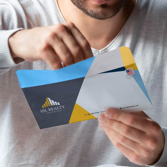 Opening branded Hil Realty Properties envelope