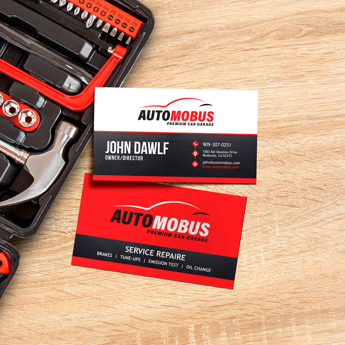Automotive repair business cards displayed with tools