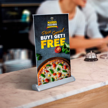 Countertop promotional banner advertising pizza special buy one get one free at pizzeria