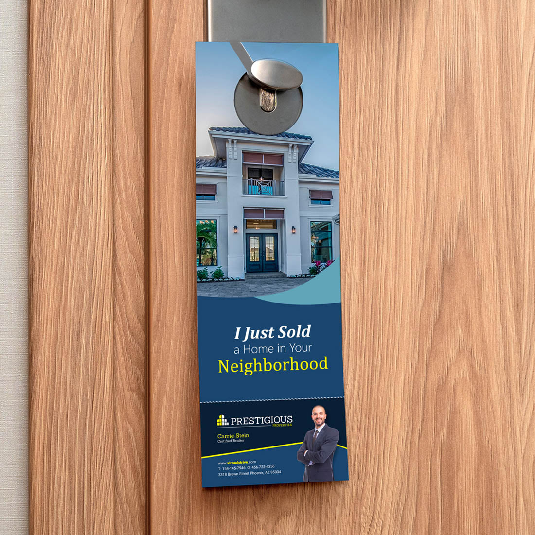 Real estate door hanger announcing a recently sold home with agent branding on door handle