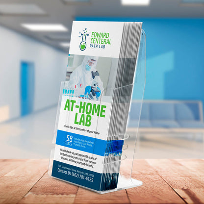 Path lab at-home testing brochures in clear display stand inside medical office