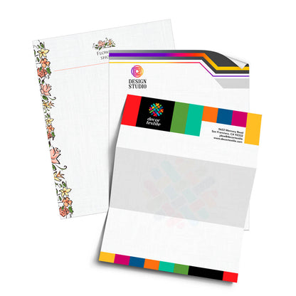 Custom letterhead set with floral border design and bold multicolor studio branding